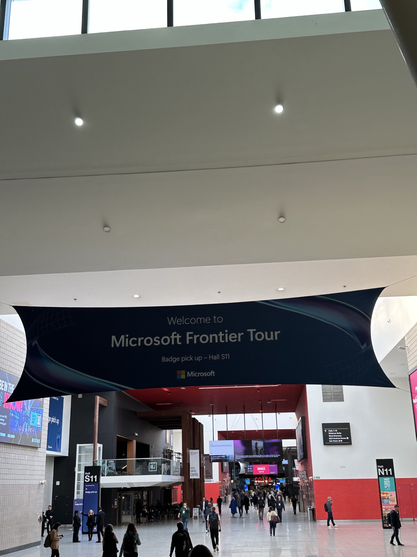 Microsoft Frontier Tour welcome banner hanging above the event entrance in London.