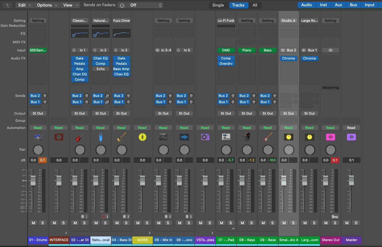 Logic Pro mixer view with grouped studio tracks and signal paths already prepared.