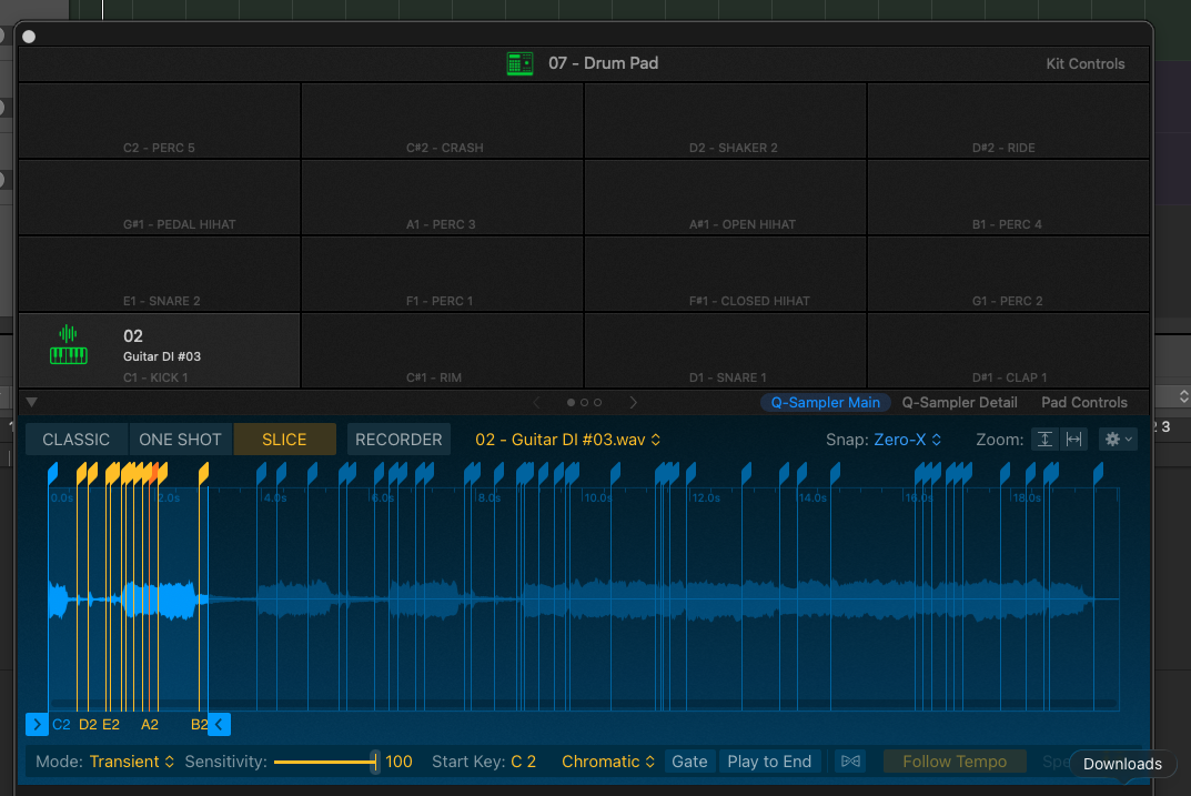 Logic Pro Drum Machine Designer with Quick Sampler open in Slice mode and a guitar waveform divided into playable slices.